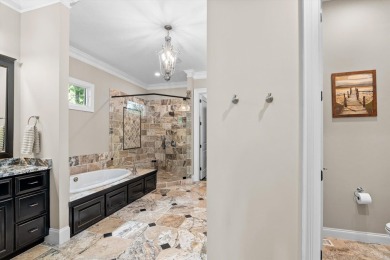 Welcome to luxury living on the largest lot in Riverwood on Champions Retreat Golf Club in Georgia - for sale on GolfHomes.com, golf home, golf lot