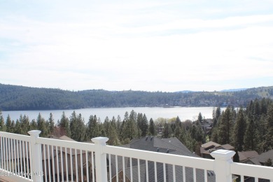 220 Lindeblad boasts panoramic lake views with the surrounding on Liberty Lake Golf Club in Washington - for sale on GolfHomes.com, golf home, golf lot