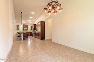 Plantation Bay - This beautifully maintained 2018 ICI-built home on Plantation Bay Golf and Country Club in Florida - for sale on GolfHomes.com, golf home, golf lot