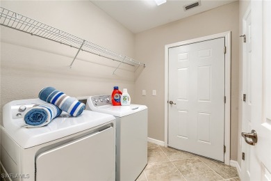 Lowest priced first floor carriage home in Casella with a unique on Pelican Preserve Golf Club in Florida - for sale on GolfHomes.com, golf home, golf lot