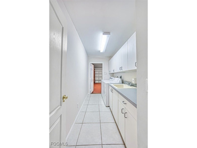 Nestled in the vibrant Cross Creek Estates GATED community on a on Cross Creek Country Club in Florida - for sale on GolfHomes.com, golf home, golf lot