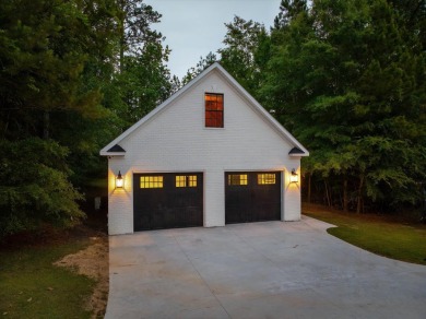 Welcome to luxury living on the largest lot in Riverwood on Champions Retreat Golf Club in Georgia - for sale on GolfHomes.com, golf home, golf lot