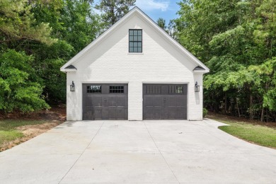 Welcome to luxury living on the largest lot in Riverwood on Champions Retreat Golf Club in Georgia - for sale on GolfHomes.com, golf home, golf lot