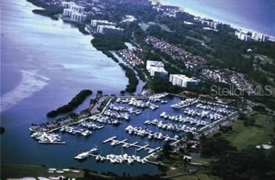 This 60' x 20' boat slip at The Longboat Key Club Moorings on Longboat Key Golf Club in Florida - for sale on GolfHomes.com, golf home, golf lot