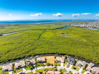 Build your dream waterfront home in the highly desirable Burnt on Twin Isles Country Club in Florida - for sale on GolfHomes.com, golf home, golf lot
