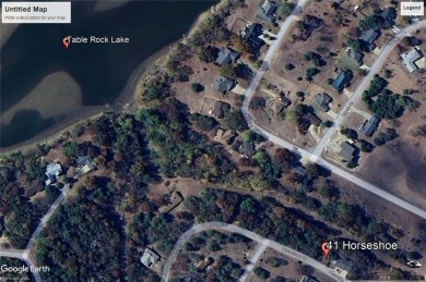 Ready for your dream home? This lot is a block from the Holiday on Holiday Island Executive Golf Course in Arkansas - for sale on GolfHomes.com, golf home, golf lot