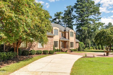 Experience luxury living where waterfront serenity meets golf on Country Club of Johnston County in North Carolina - for sale on GolfHomes.com, golf home, golf lot
