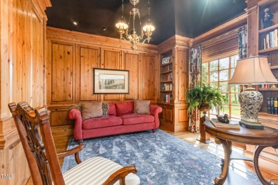 Experience luxury living where waterfront serenity meets golf on Country Club of Johnston County in North Carolina - for sale on GolfHomes.com, golf home, golf lot