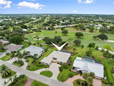 Wake up every day to the beauty of Florida living in this CBS on Yacht and Country Club in Florida - for sale on GolfHomes.com, golf home, golf lot