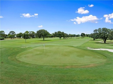 Wake up every day to the beauty of Florida living in this CBS on Yacht and Country Club in Florida - for sale on GolfHomes.com, golf home, golf lot