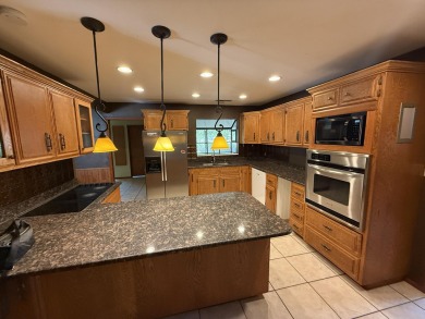 This 4,000+ square foot home is in the perfect location behind on Bloomington Country Club in Utah - for sale on GolfHomes.com, golf home, golf lot