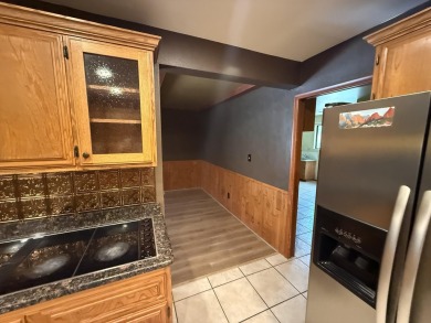 This 4,000+ square foot home is in the perfect location behind on Bloomington Country Club in Utah - for sale on GolfHomes.com, golf home, golf lot