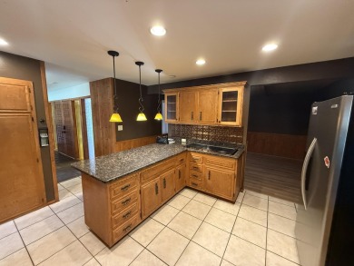 This 4,000+ square foot home is in the perfect location behind on Bloomington Country Club in Utah - for sale on GolfHomes.com, golf home, golf lot