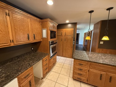 This 4,000+ square foot home is in the perfect location behind on Bloomington Country Club in Utah - for sale on GolfHomes.com, golf home, golf lot