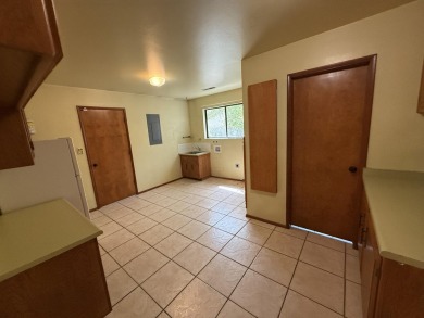 This 4,000+ square foot home is in the perfect location behind on Bloomington Country Club in Utah - for sale on GolfHomes.com, golf home, golf lot