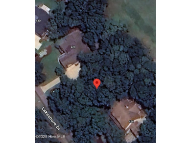 Build your dream home at the coast on this beautiful golf front on Sea Trail Golf Resort in North Carolina - for sale on GolfHomes.com, golf home, golf lot
