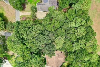 Build your dream home at the coast on this beautiful golf front on Sea Trail Golf Resort in North Carolina - for sale on GolfHomes.com, golf home, golf lot
