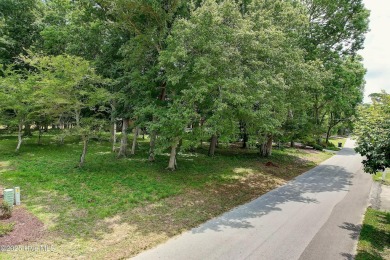 Build your dream home at the coast on this beautiful golf front on Sea Trail Golf Resort in North Carolina - for sale on GolfHomes.com, golf home, golf lot