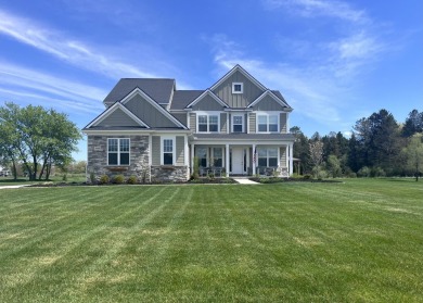 Like new and move-in ready, this exceptional 4-bedroom, 2.5-bath on Timber Trace Golf Club in Michigan - for sale on GolfHomes.com, golf home, golf lot