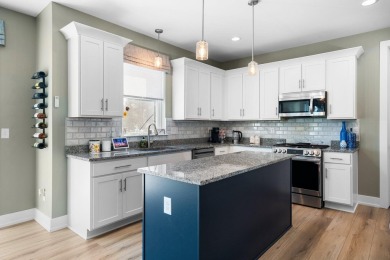 Like new and move-in ready, this exceptional 4-bedroom, 2.5-bath on Timber Trace Golf Club in Michigan - for sale on GolfHomes.com, golf home, golf lot