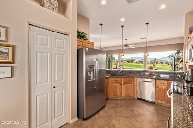 Sundrenched and move-in ready, this Extended Keystone model sits on Heritage Highlands At Dove Mountain in Arizona - for sale on GolfHomes.com, golf home, golf lot