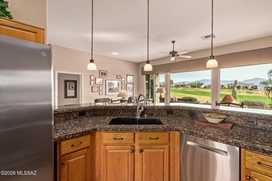 Sundrenched and move-in ready, this Extended Keystone model sits on Heritage Highlands At Dove Mountain in Arizona - for sale on GolfHomes.com, golf home, golf lot