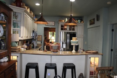 This beautifully crafted custom brick duplex is full of charm on Rolling Hills Country Club in Kentucky - for sale on GolfHomes.com, golf home, golf lot