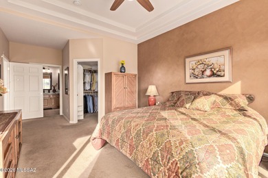 Sundrenched and move-in ready, this Extended Keystone model sits on Heritage Highlands At Dove Mountain in Arizona - for sale on GolfHomes.com, golf home, golf lot