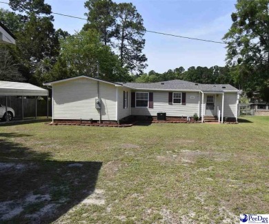 Deeded lot all the way down to the water in Roland subdivision on Players Course At Wyboo Plantation in South Carolina - for sale on GolfHomes.com, golf home, golf lot