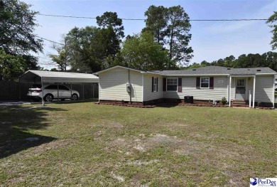 Deeded lot all the way down to the water in Roland subdivision on Players Course At Wyboo Plantation in South Carolina - for sale on GolfHomes.com, golf home, golf lot