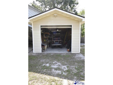 Deeded lot all the way down to the water in Roland subdivision on Players Course At Wyboo Plantation in South Carolina - for sale on GolfHomes.com, golf home, golf lot