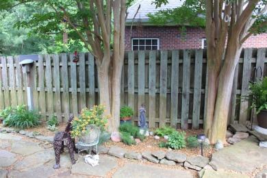 This beautifully crafted custom brick duplex is full of charm on Rolling Hills Country Club in Kentucky - for sale on GolfHomes.com, golf home, golf lot
