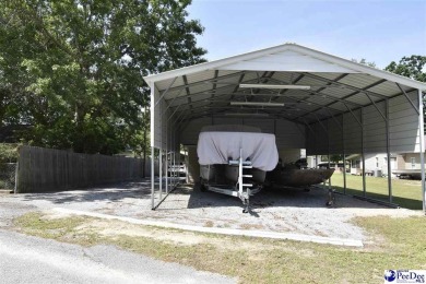 Deeded lot all the way down to the water in Roland subdivision on Players Course At Wyboo Plantation in South Carolina - for sale on GolfHomes.com, golf home, golf lot