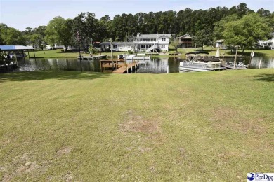 Deeded lot all the way down to the water in Roland subdivision on Players Course At Wyboo Plantation in South Carolina - for sale on GolfHomes.com, golf home, golf lot