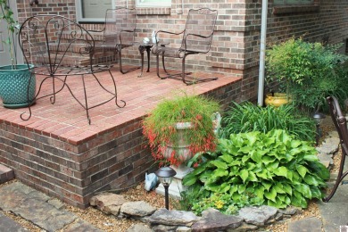 This beautifully crafted custom brick duplex is full of charm on Rolling Hills Country Club in Kentucky - for sale on GolfHomes.com, golf home, golf lot