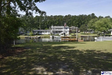 Deeded lot all the way down to the water in Roland subdivision on Players Course At Wyboo Plantation in South Carolina - for sale on GolfHomes.com, golf home, golf lot