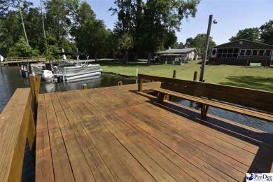 Deeded lot all the way down to the water in Roland subdivision on Players Course At Wyboo Plantation in South Carolina - for sale on GolfHomes.com, golf home, golf lot