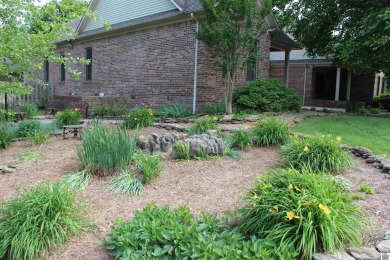 This beautifully crafted custom brick duplex is full of charm on Rolling Hills Country Club in Kentucky - for sale on GolfHomes.com, golf home, golf lot