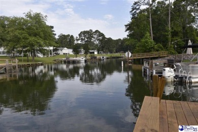 Deeded lot all the way down to the water in Roland subdivision on Players Course At Wyboo Plantation in South Carolina - for sale on GolfHomes.com, golf home, golf lot