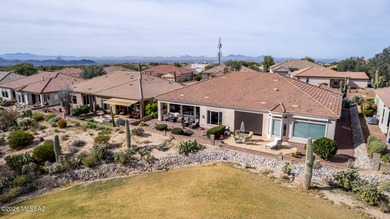 Sundrenched and move-in ready, this Extended Keystone model sits on Heritage Highlands At Dove Mountain in Arizona - for sale on GolfHomes.com, golf home, golf lot