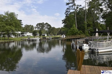 Deeded lot all the way down to the water in Roland subdivision on Players Course At Wyboo Plantation in South Carolina - for sale on GolfHomes.com, golf home, golf lot