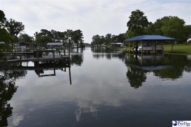 Deeded lot all the way down to the water in Roland subdivision on Players Course At Wyboo Plantation in South Carolina - for sale on GolfHomes.com, golf home, golf lot