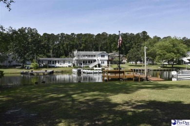 Deeded lot all the way down to the water in Roland subdivision on Players Course At Wyboo Plantation in South Carolina - for sale on GolfHomes.com, golf home, golf lot