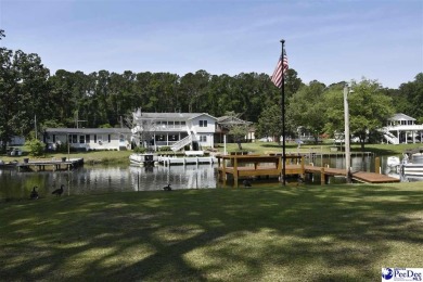 Deeded lot all the way down to the water in Roland subdivision on Players Course At Wyboo Plantation in South Carolina - for sale on GolfHomes.com, golf home, golf lot