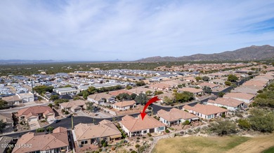 Sundrenched and move-in ready, this Extended Keystone model sits on Heritage Highlands At Dove Mountain in Arizona - for sale on GolfHomes.com, golf home, golf lot