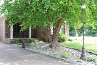 This beautifully crafted custom brick duplex is full of charm on Rolling Hills Country Club in Kentucky - for sale on GolfHomes.com, golf home, golf lot