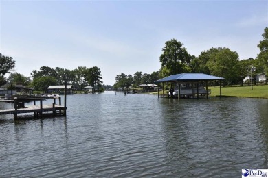 Deeded lot all the way down to the water in Roland subdivision on Players Course At Wyboo Plantation in South Carolina - for sale on GolfHomes.com, golf home, golf lot