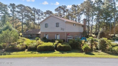 NOW AVAILABLE - GRANDIOSE, CUSTOM BUILT HOME WITH LARGE SPACES on Brandywine Bay Golf Club in North Carolina - for sale on GolfHomes.com, golf home, golf lot