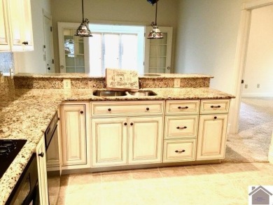This beautifully crafted custom brick duplex is full of charm on Rolling Hills Country Club in Kentucky - for sale on GolfHomes.com, golf home, golf lot