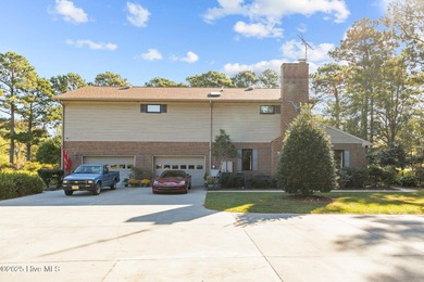 NOW AVAILABLE - GRANDIOSE, CUSTOM BUILT HOME WITH LARGE SPACES on Brandywine Bay Golf Club in North Carolina - for sale on GolfHomes.com, golf home, golf lot